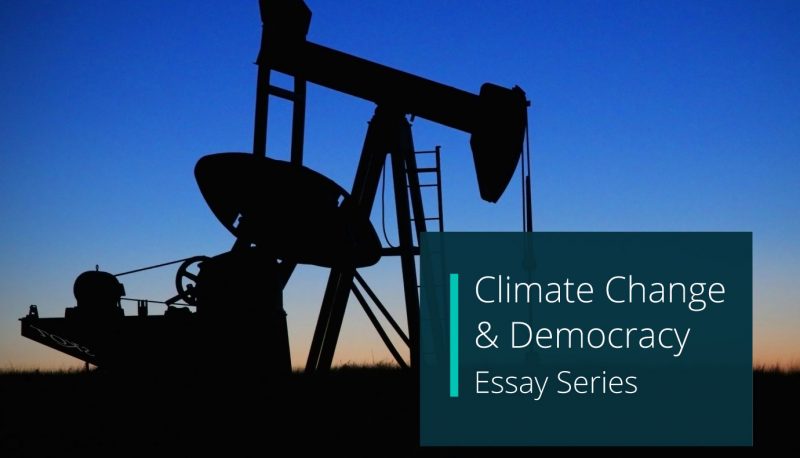Image of oil drilling equipment with a teal text box overlaid, with white text that reads "Climate Change & Democracy Essay Series"