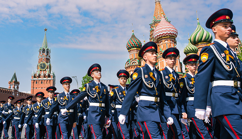 Young men in military uniforms on Red Square in Moscow against the background of the Kremlin. A detachment of soldiers of the Russian army: Moscow, Russia, 2019