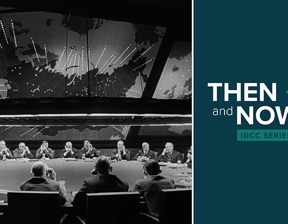 IGCC Then and Now essay series thumbnail, featuring a still image of The War Room from the film "Dr. Strangelove"