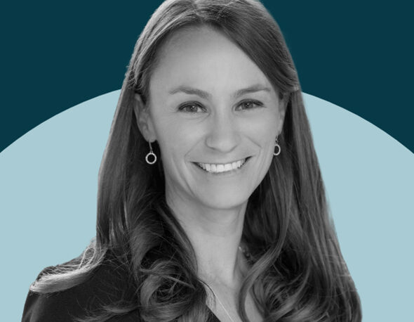 black and white headshot of Sheena Greitens overlaid on a two-tone blue background